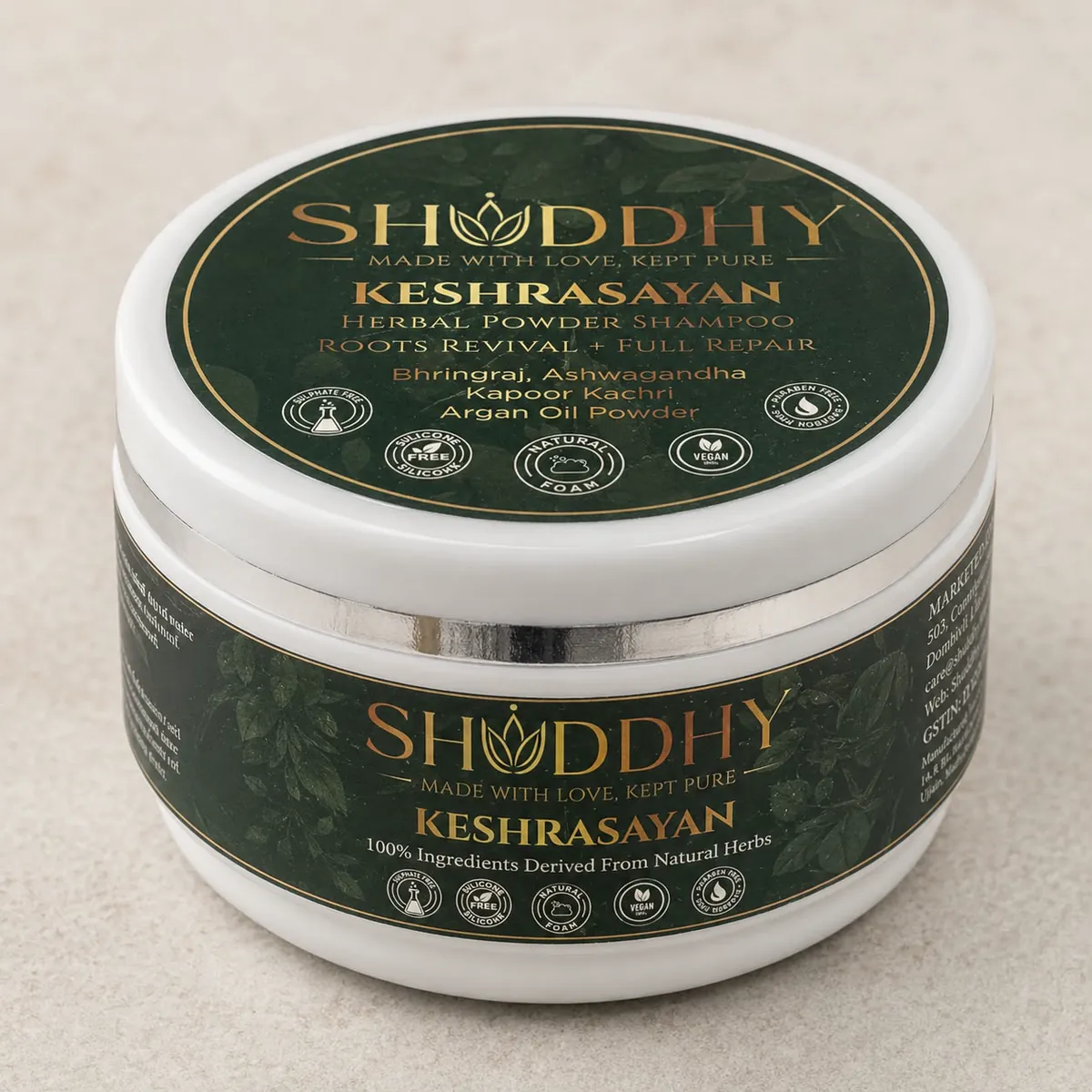 KESHRASAYAN herbal hair wash jar, front view of the pack on a plain stone background